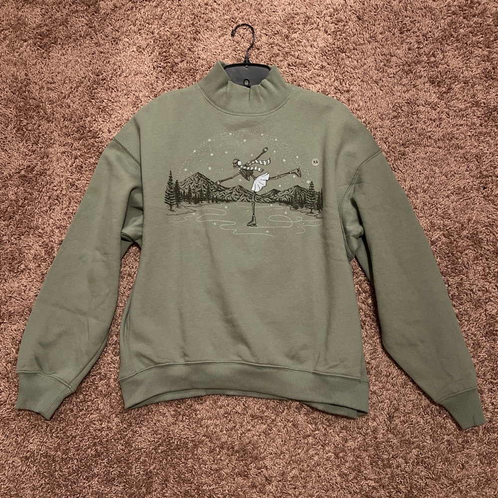 American Eagle Outfitters green crewneck sweater.